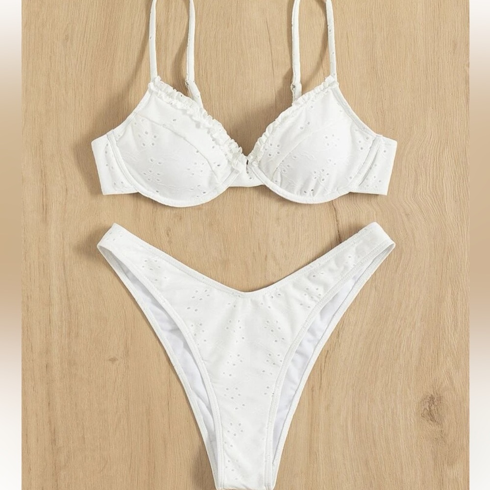 White bikini with flower design and frill trim